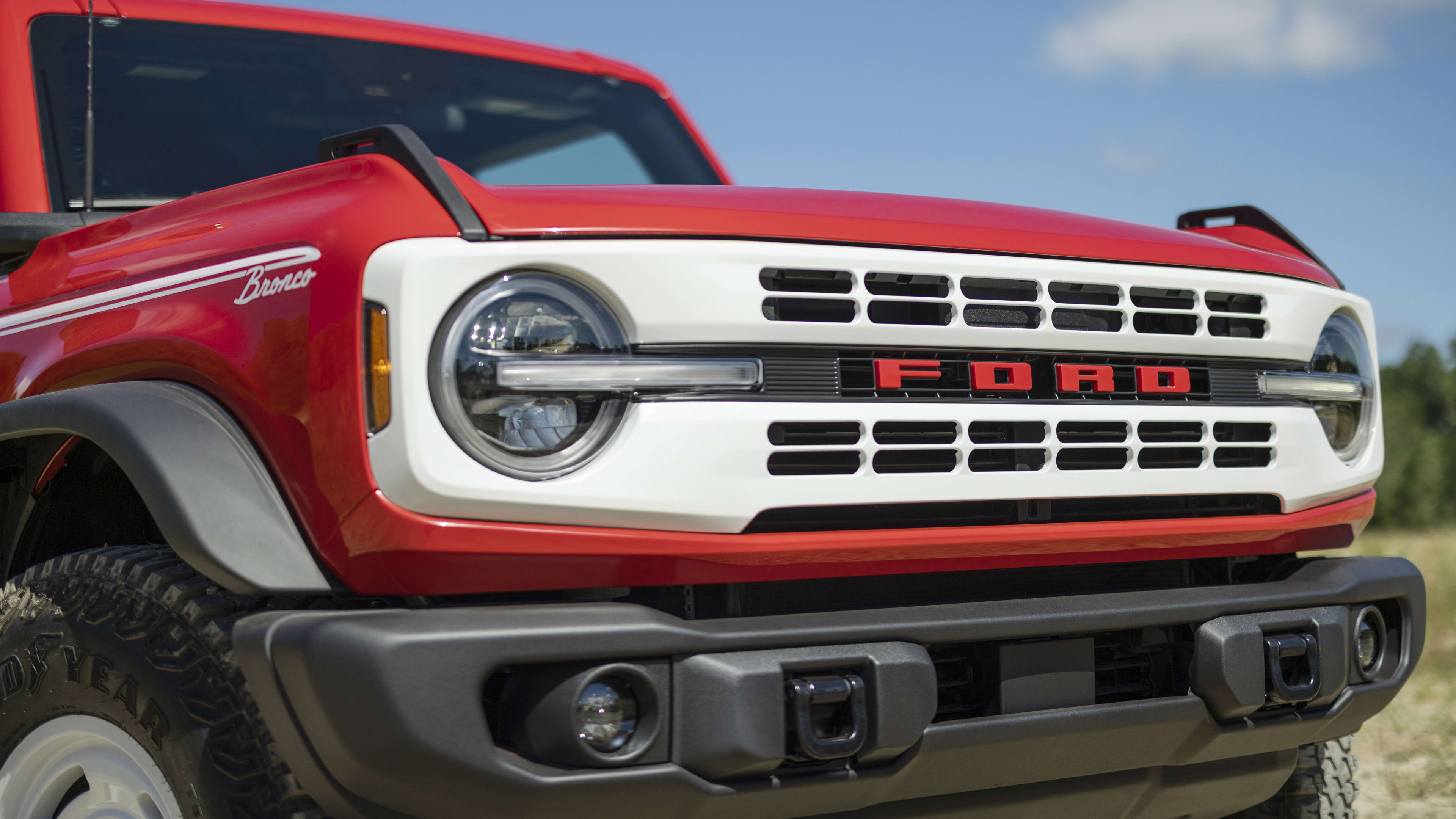 Bronco Heritage Edition available winter 2023. Limited availability. Preproduction models shown.  Always consult the Owner’s Manual before off-road driving, know your terrain and trail difficulty, and use appropriate safety gear.