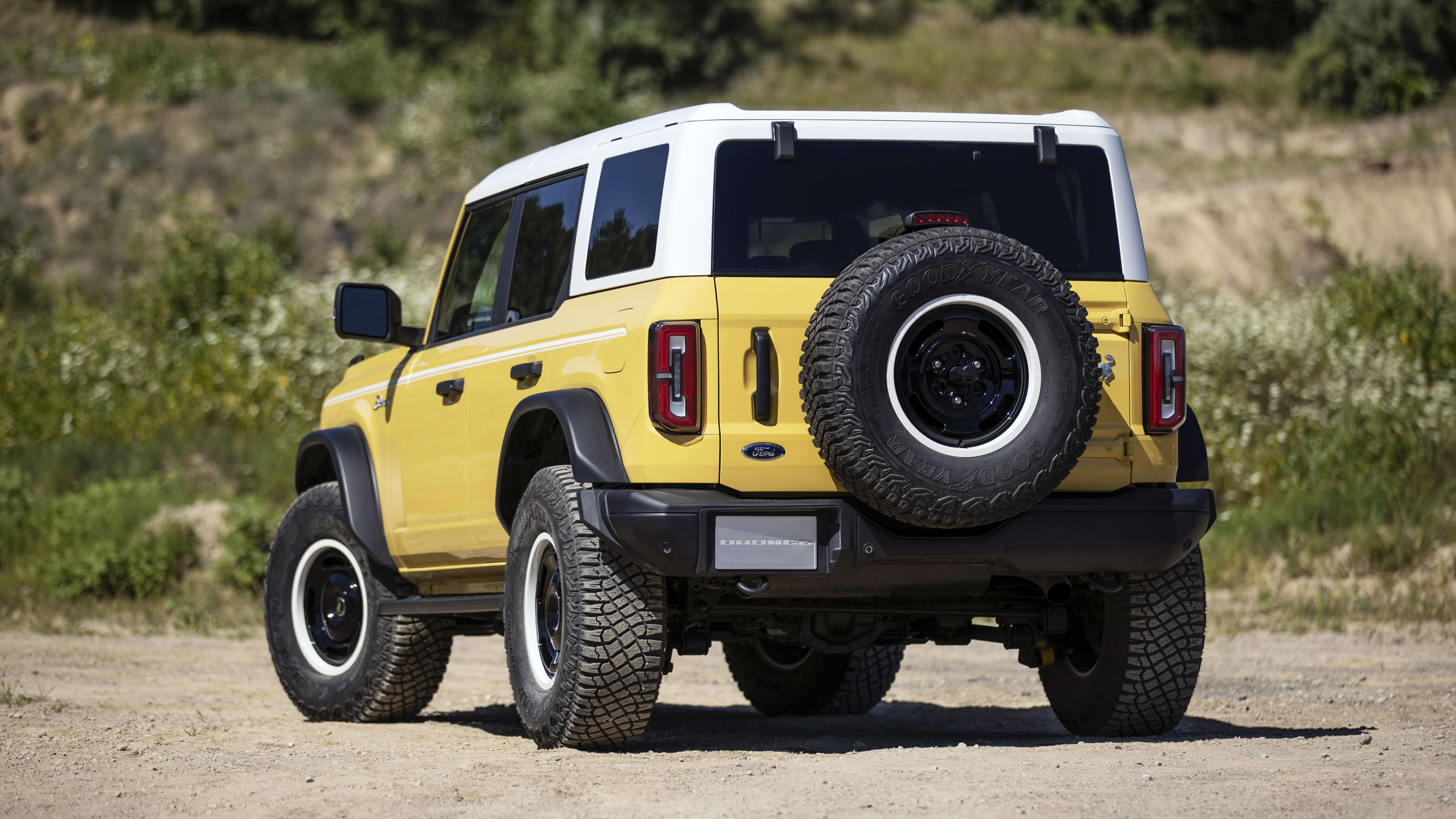 Bronco Heritage Limited Edition available winter 2023.  Limited availability. Preproduction models shown.  Always consult the Owner’s Manual before off-road driving, know your terrain and trail difficulty, and use appropriate safety gear.