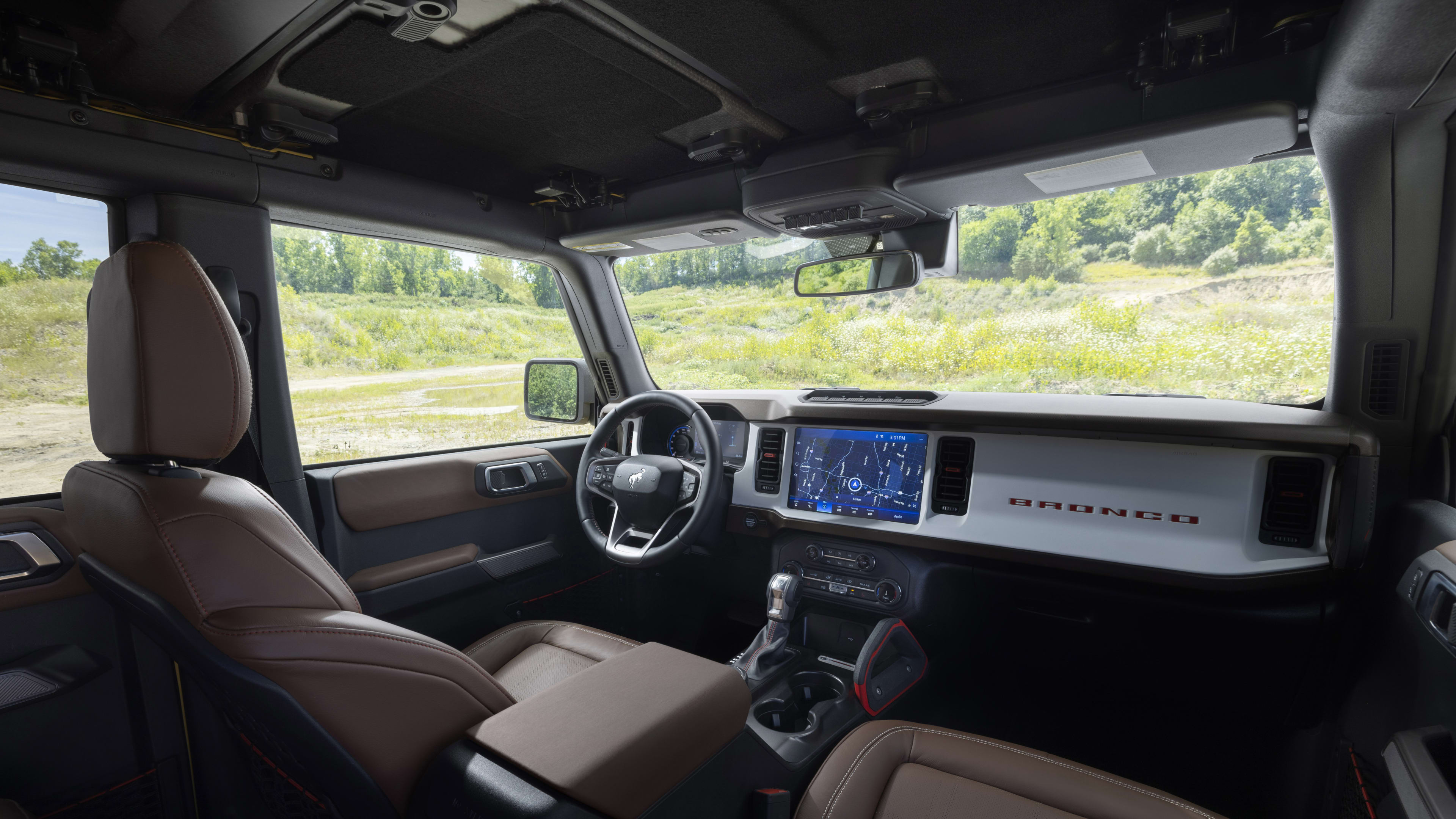 Bronco Heritage Limited Edition available winter 2023.  Limited availability. Preproduction models shown.  Always consult the Owner’s Manual before off-road driving, know your terrain and trail difficulty, and use appropriate safety gear.