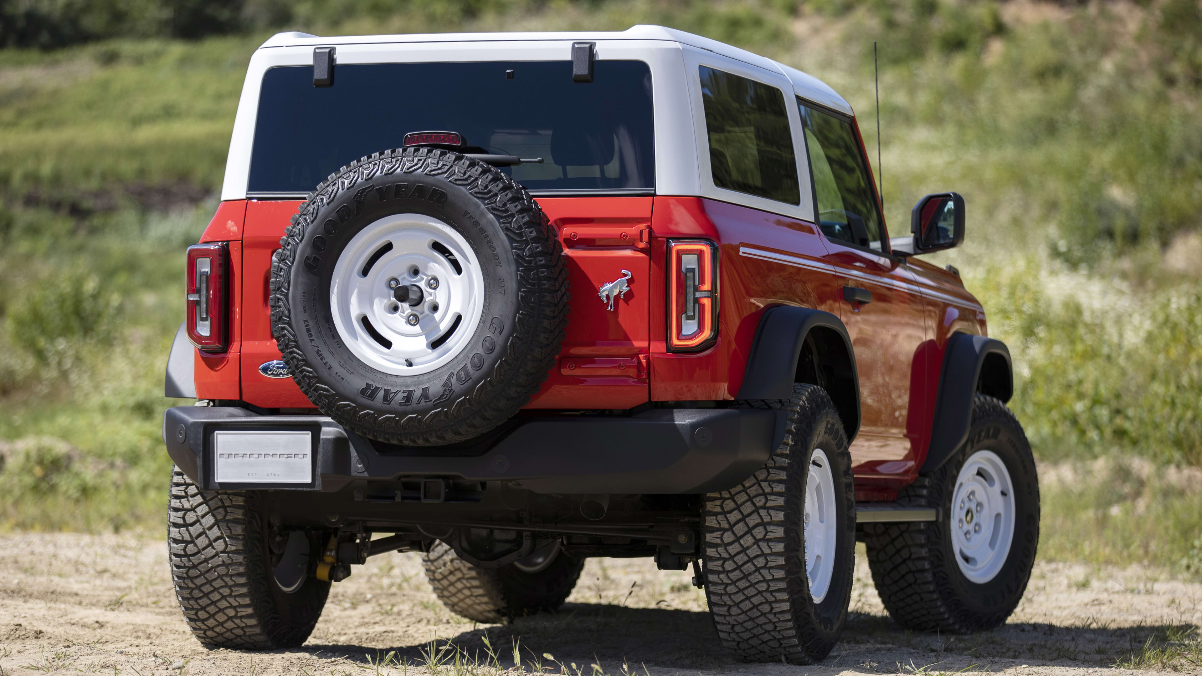 Bronco Heritage Edition available winter 2023. Limited availability. Preproduction models shown.  Always consult the Owner’s Manual before off-road driving, know your terrain and trail difficulty, and use appropriate safety gear.